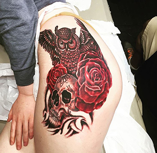 thigh tattoo red skull virginia